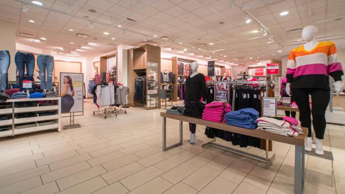 A modern Lane Bryant store interior showing the denim assortment and Cacique bra wall