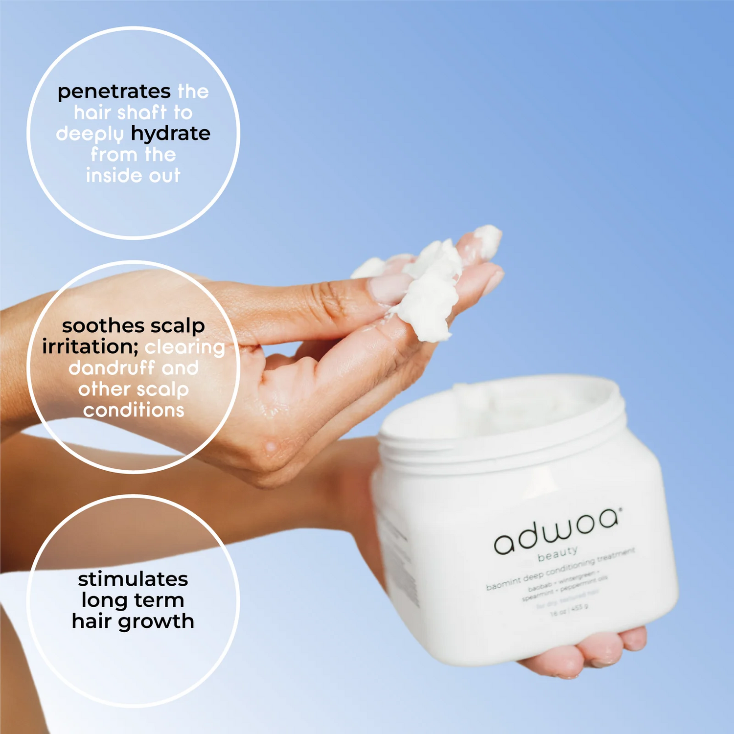 Adwoa Beauty Baomint shampoo, leave-in, and deep conditioner arranged on a cream linen flat lay