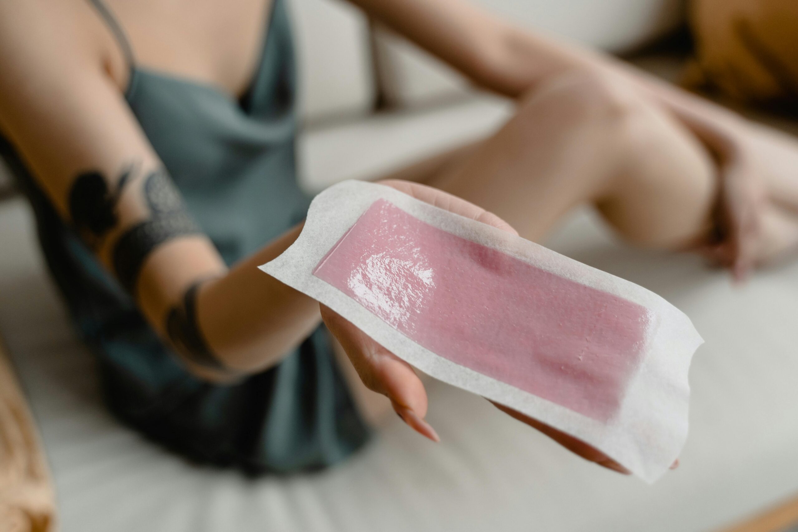 Close-up of a soft wax strip in a Brazilian wax service