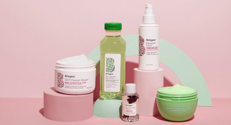 Briogeo hair care product lineup arranged in editorial flat lay photography