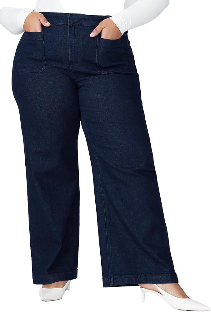 Close-up of Eloquii wide-leg indigo denim showing natural fade and hardware after months of wear