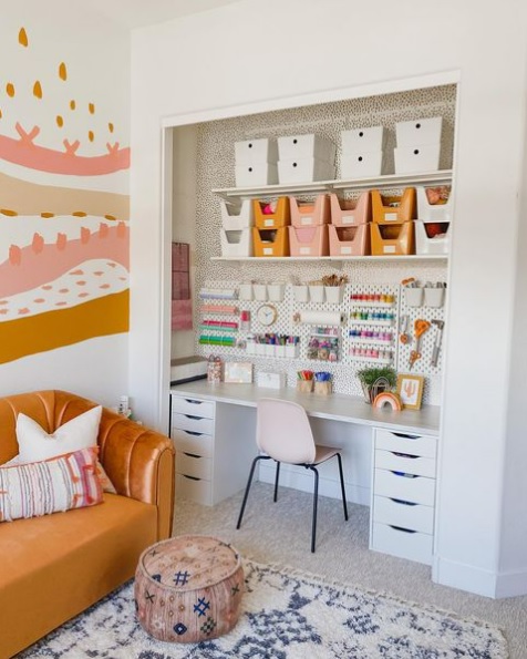 DIY crafting workspace with supplies and finished home decor projects