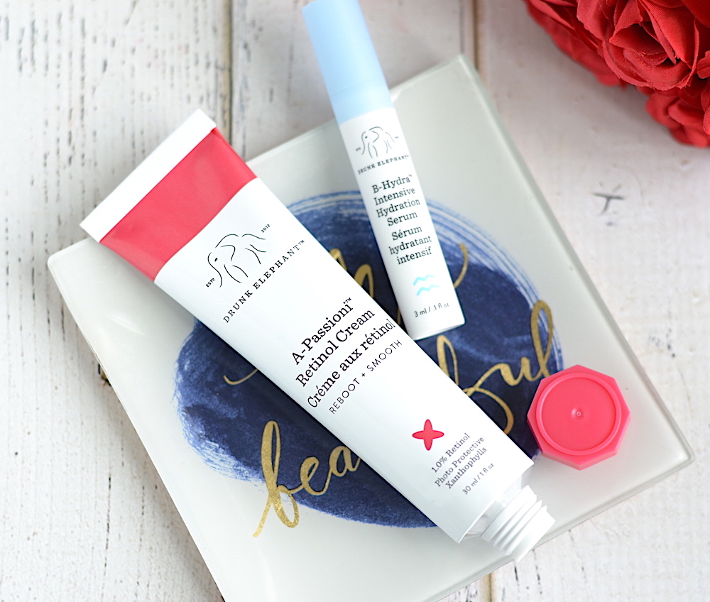 Drunk Elephant A-Passioni Retinol Cream tube with a sample of cream swatched on deeper skin