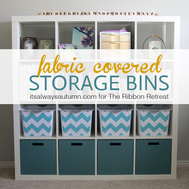 Fabric-covered storage boxes organized on shelves