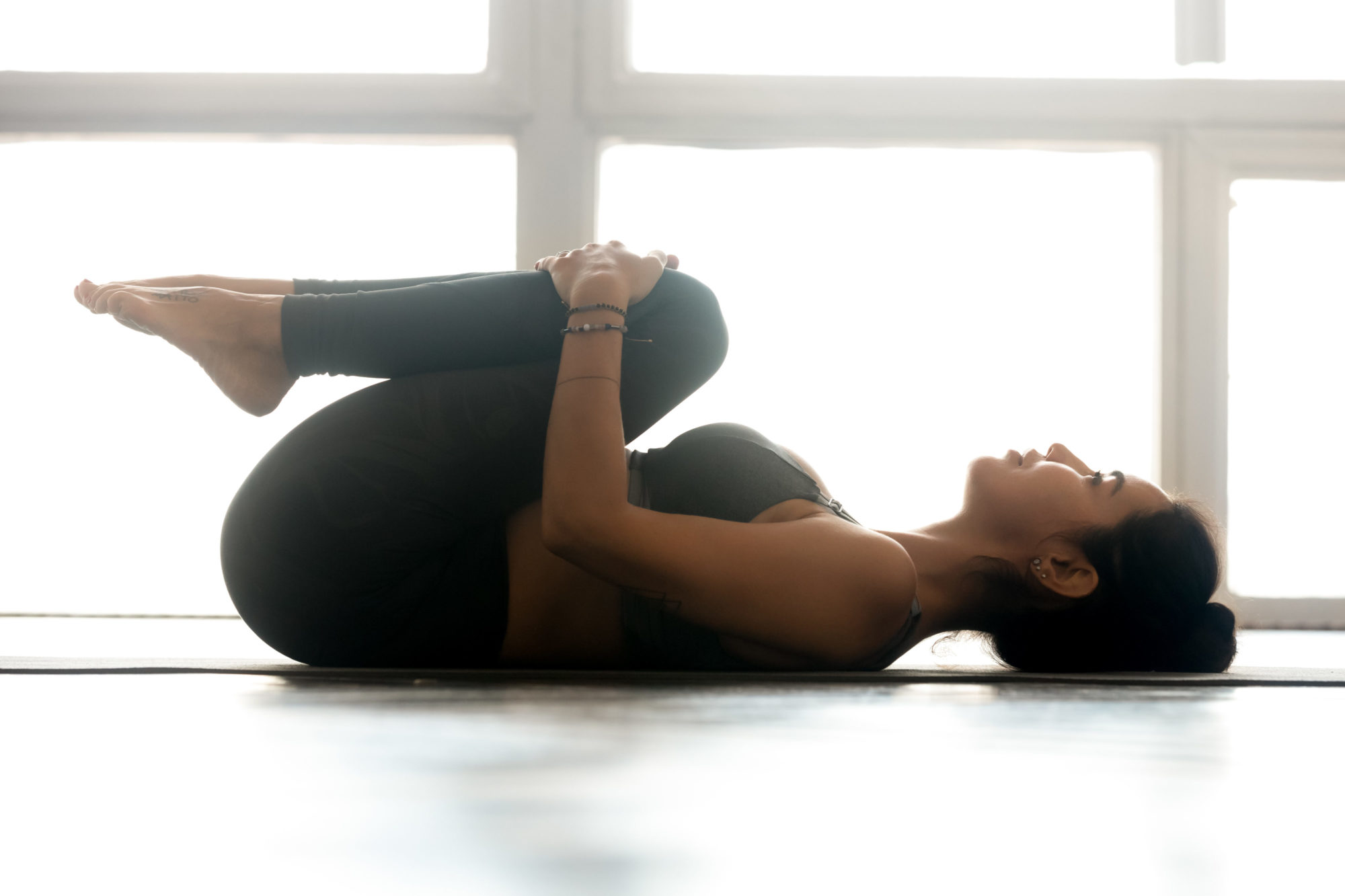 Knees-to-Chest (1.5 Minutes)