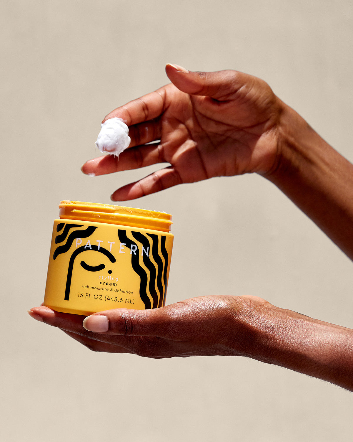 Pattern Beauty styling cream in a sunlit bathroom lifestyle shot