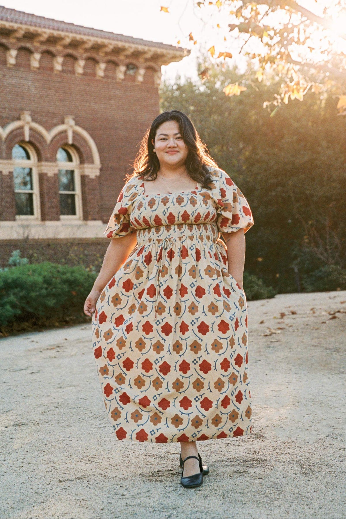 Christy Dawn Plus regenerative cotton dress hanging in natural light