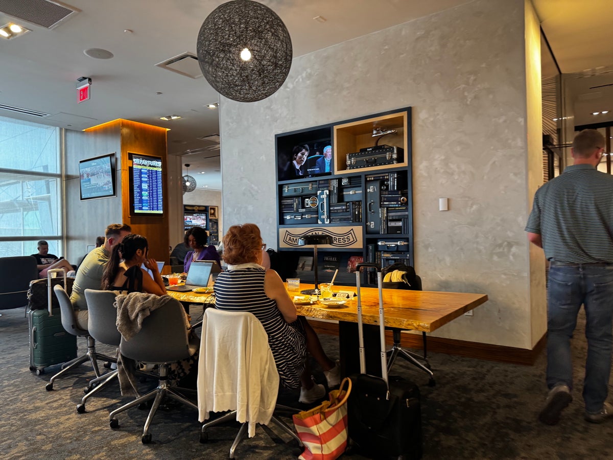 Centurion Lounge LAS Las Vegas plus-size traveler relaxing