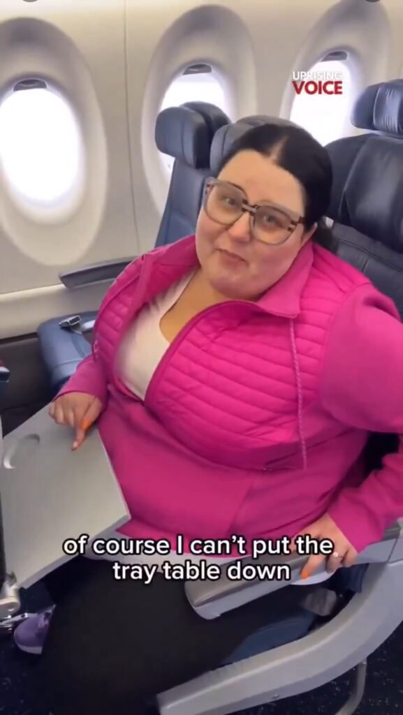 plus-size woman exiting airplane Rome airport with carry-on confident