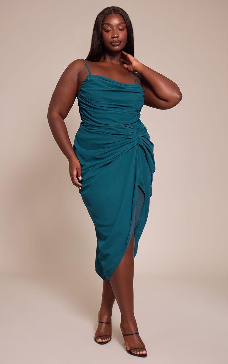 plus-size Black woman emerald green dress confident colorful wardrobe