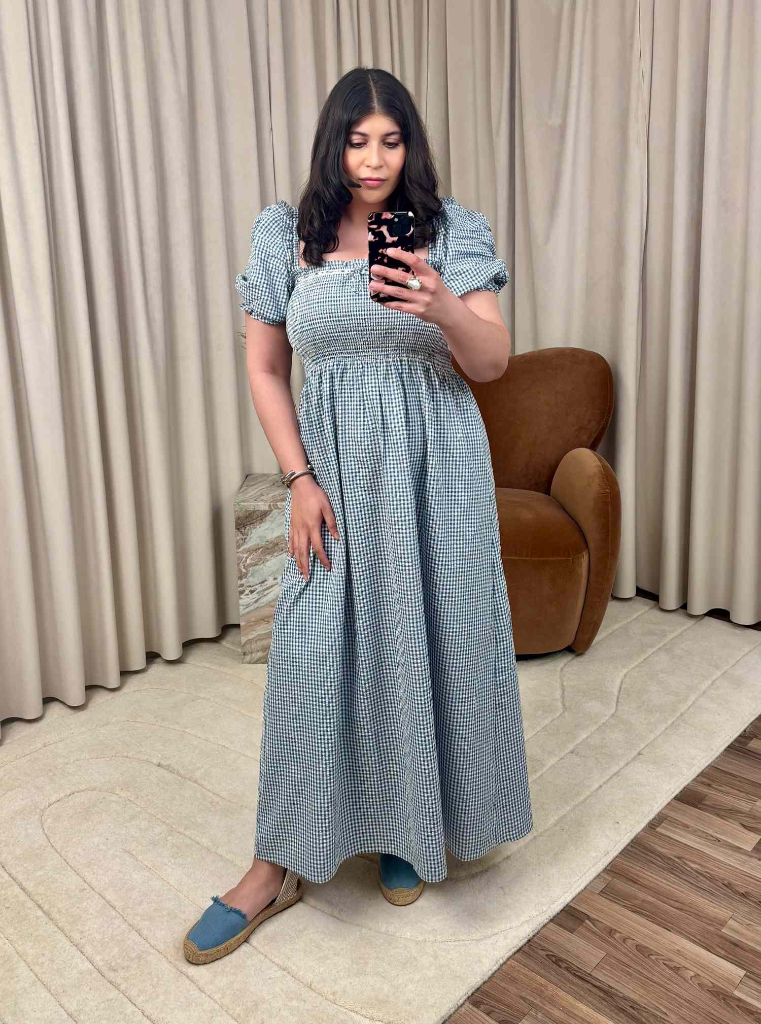 plus-size woman wearing Hill House nap dress 4X smiling outdoors