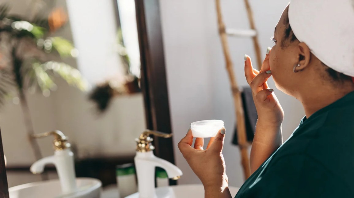 Black woman bathroom morning skincare routine minimalist 4 products