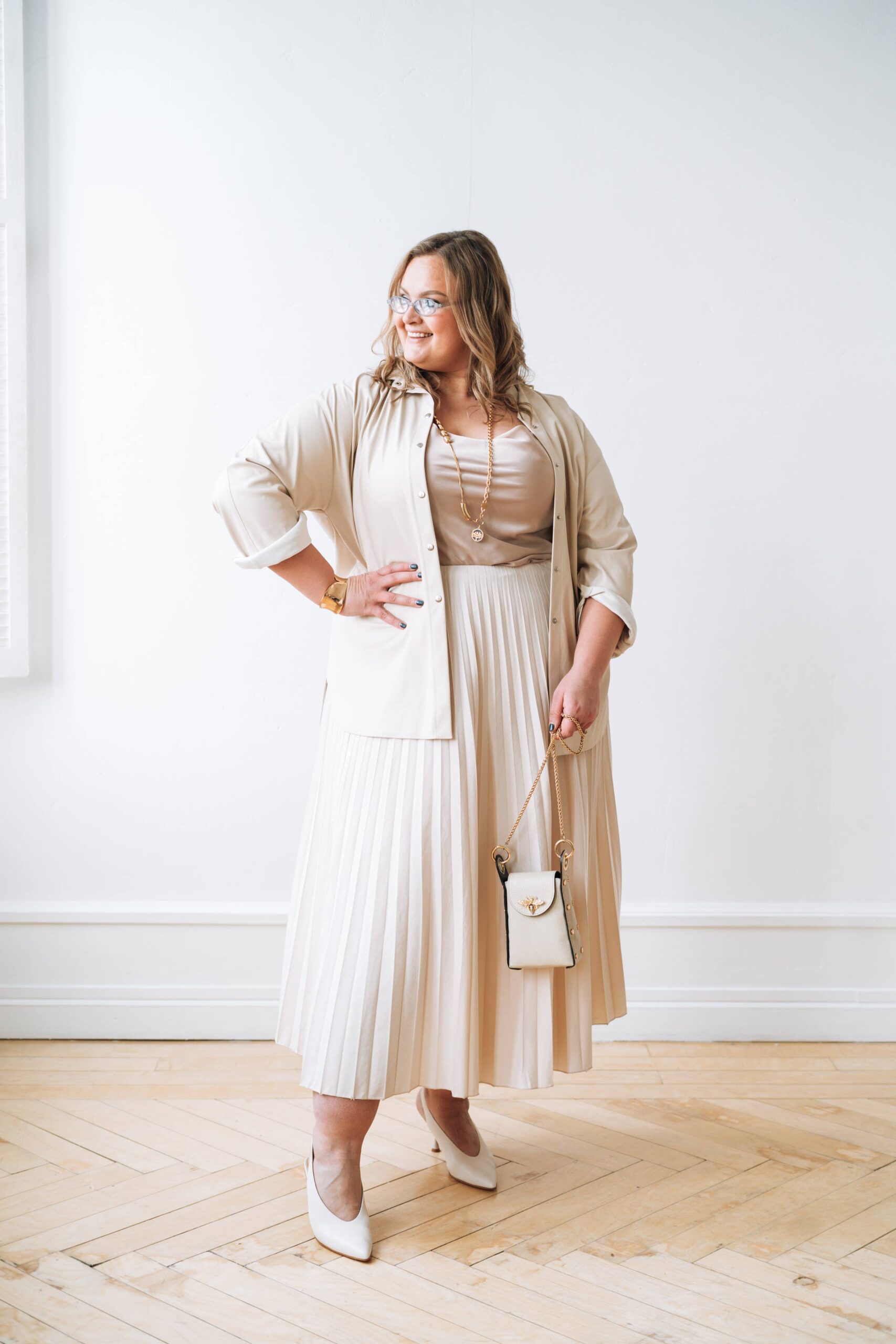 Plus size woman size 18 in tonal beige column outfit princess seamed skirt oversized shirt natural light
