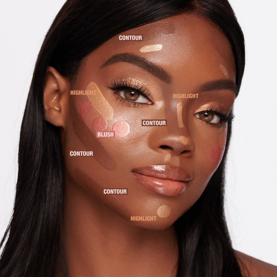 NC45 neutral-warm cheek wearing Charlotte Tilbury Cheek to Chic blush blended onto the apple