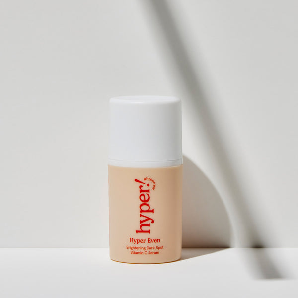 Hyper Skin Hyper Clear Brightening Dark Spot Vitamin C Serum bottle on a marble counter
