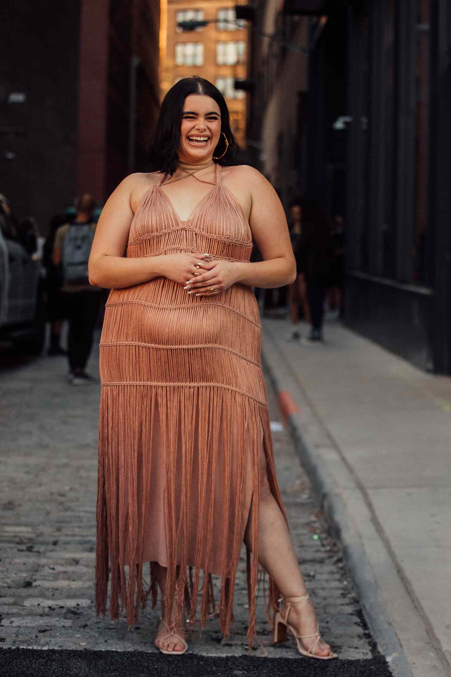 A plus-size woman looking cool and comfortable outdoors on a hot day