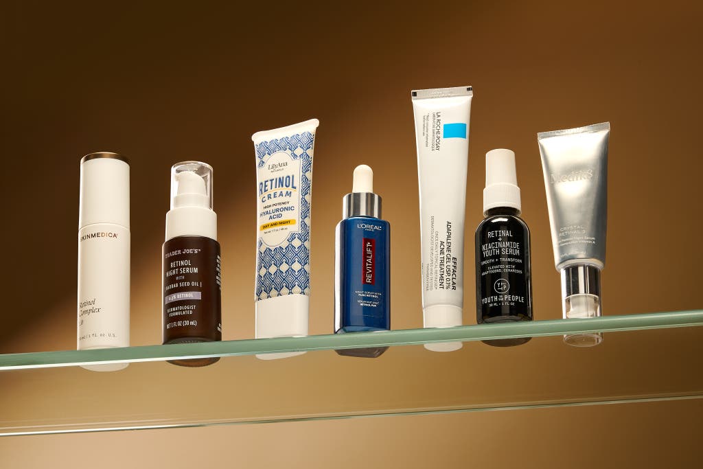 Affordable drugstore retinol products arranged on bathroom counter