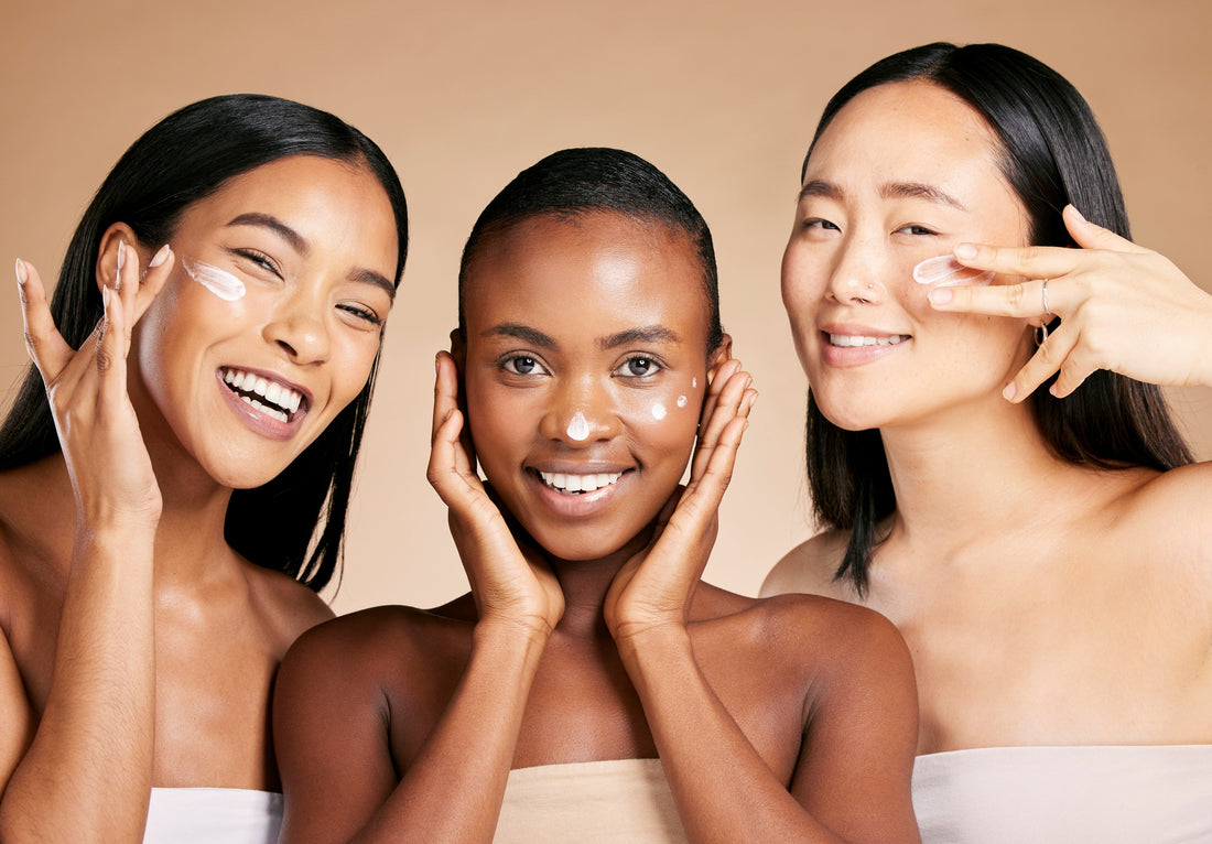 Diverse women each holding one skincare product, representing minimalist routines for different skin types