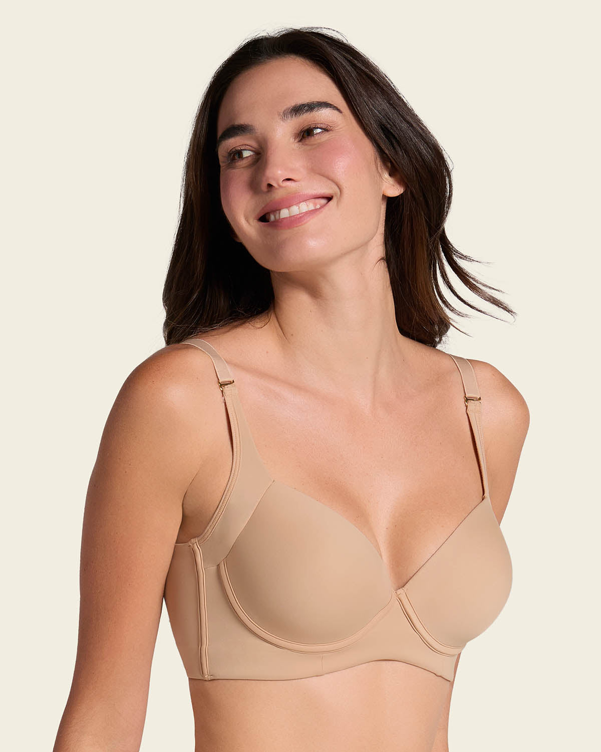 Full-cup supportive bras with wide straps arranged on a light background