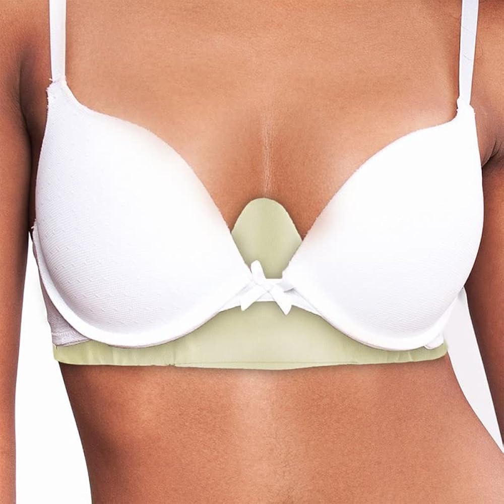 Soft cotton and bamboo bra liners folded neatly on a light surface