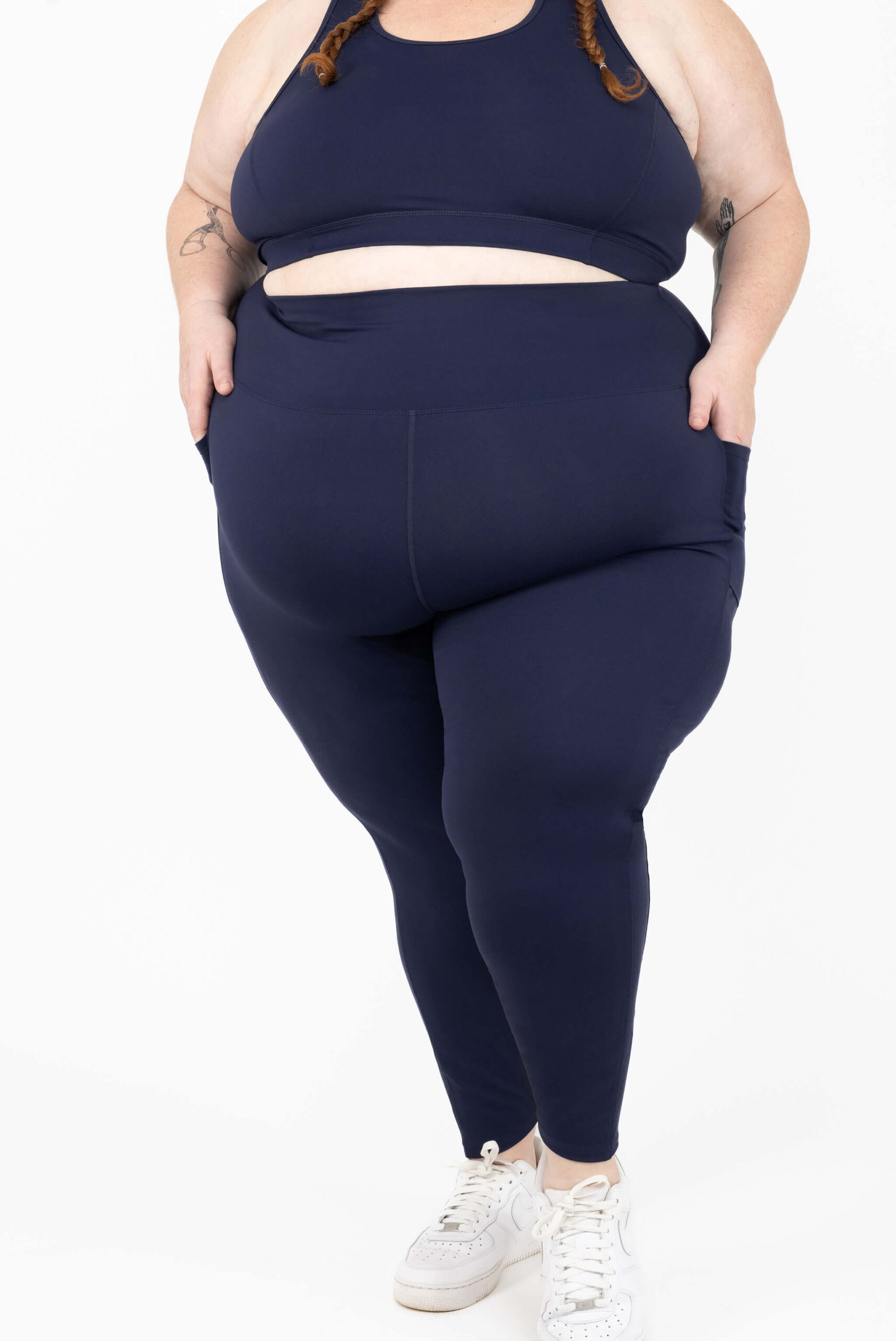 Superfit Hero SuperHold leggings on a plus size model
