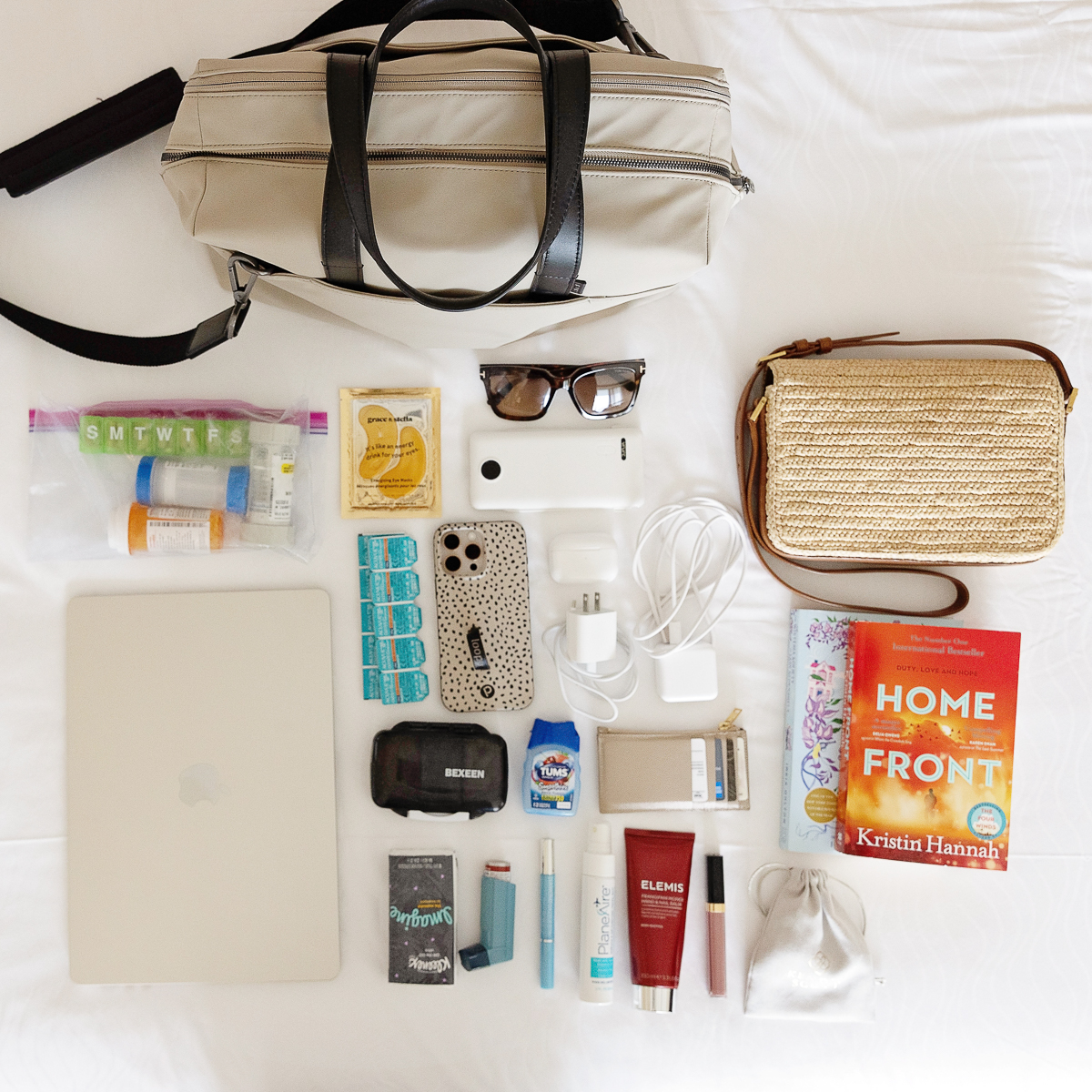 Open carry-on bag packed with travel comfort essentials