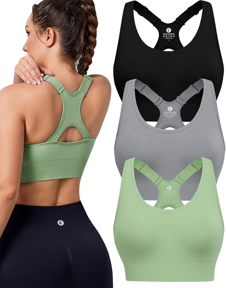 Woman in a supportive high impact sports bra adjusting the shoulder straps